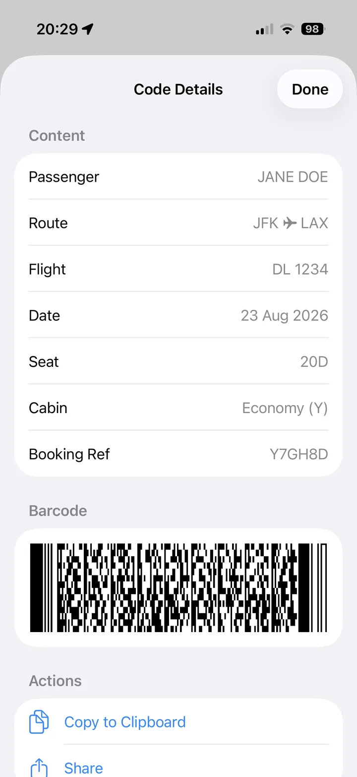 A decoded boarding pass showing passenger, route, flight, date, seat, cabin and booking reference