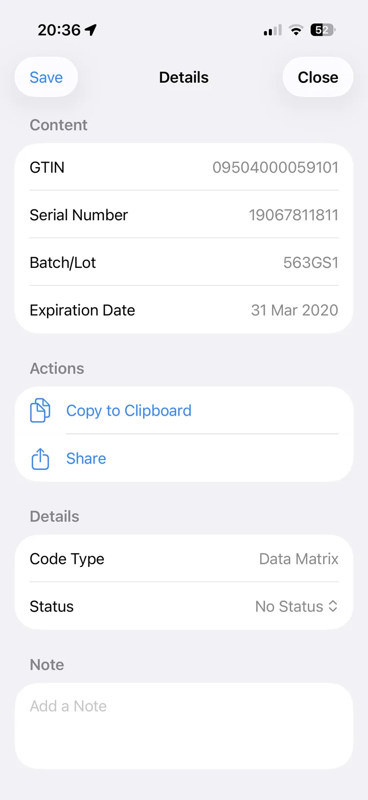 A scanned QR code result showing a URL with Copy, Share and Open URL actions and a note field